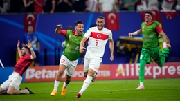 Turkey’s Cenk Tosun, centre, celebrates his stoppage-time winner against the Czech Republic (Petr David Josek/AP)