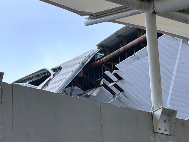 A view of the damage to a part of a departure terminal canopy at New Delhi’s Indira Gandhi International Airport that collapsed in heavy monsoon rains
