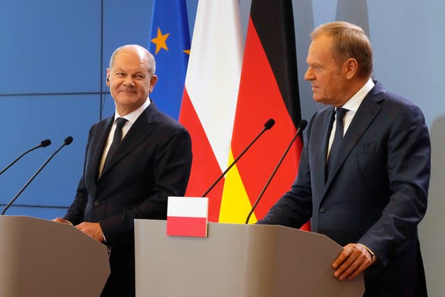 German Chancellor Olaf Scholz and Polish Prime Minister Donald Tusk attend a press conference after German-Polish inter-governmental consultations in Warsaw 
