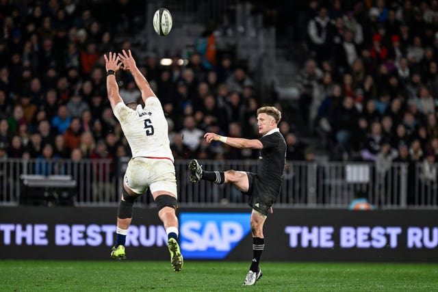 George Martin attempts to block a kick from New Zealand’s Damian McKenzie