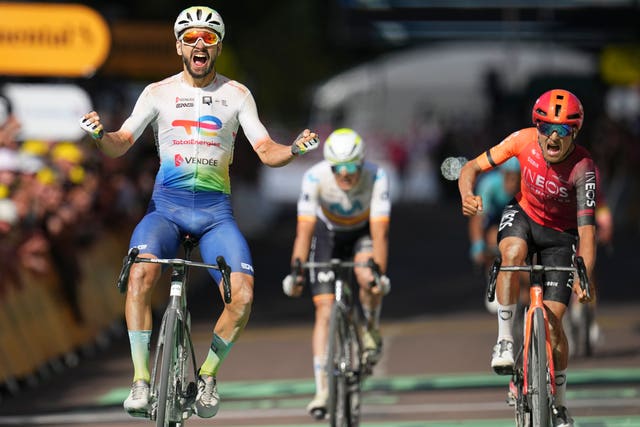 Anthony Turgis celebrates winning stage nine of the Tour de France