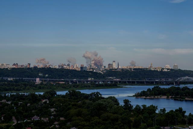 Smoke rises over the Kyiv skyline after a Russian attack,