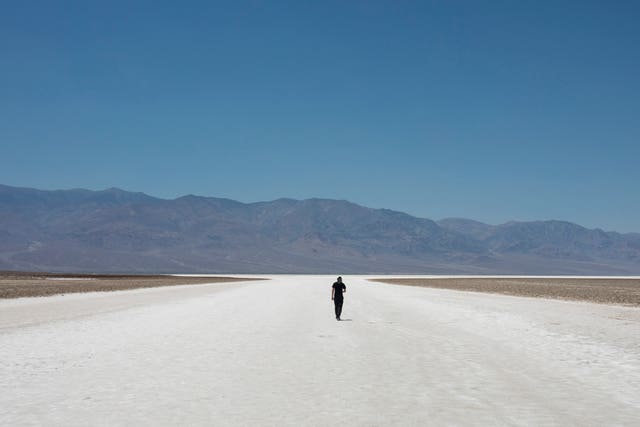 Sheik Mabrouki, of Algeria, walks through Badwater Basin
