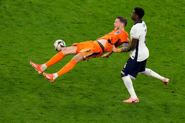 England’s Marc Guehi fights for the ball against Wout Weghorst of the Netherlands during the Euro 2024 semi-final