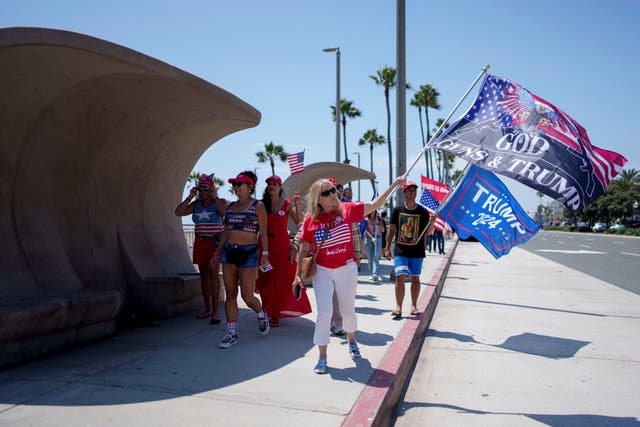 People rally in support of Republican presidential candidate former president Donald Trump 