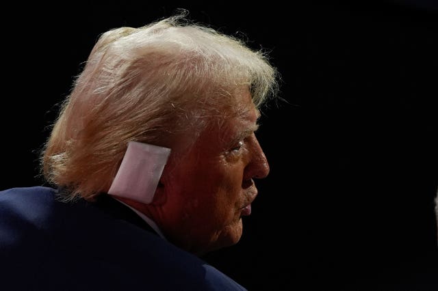 Donald Trump with a bandage on his right ear