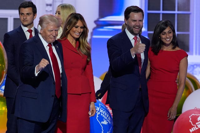 Republican presidential candidate Donald Trump, former first lady Melania Trump, Republican vice presidential candidate Senator JD Vance and his wife Usha Vance on stage together