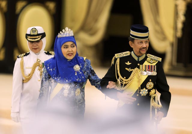 The Sultan of Brunei and his wife attend the ceremony