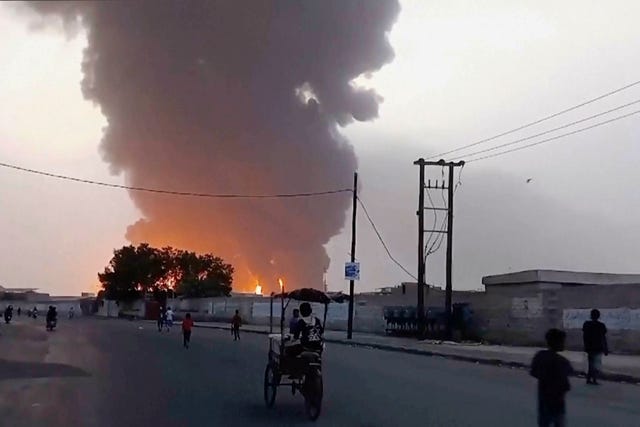 Smoke and flames rise from a site in Hodeidah, Yemen