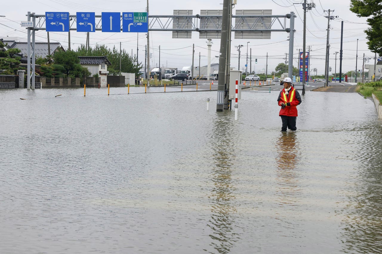 Hundreds flee as heavy rain in northern Japan triggers floods and ...