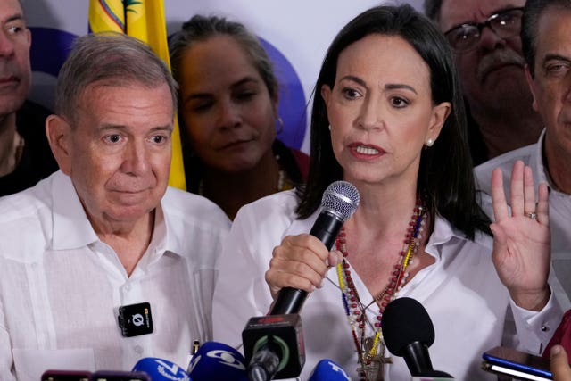 Opposition leader Maria Corina Machado, right, and presidential candidate Edmundo Gonzalez hold a press conference 