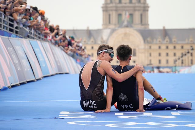 Hayden Wilde, left, puts his arm round Alex Yee 