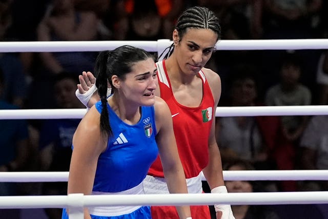 Algerian boxer Imane Khelif, right, looks at Italy’s Angela Carini, following their bout at the 2024 Paris Olympics