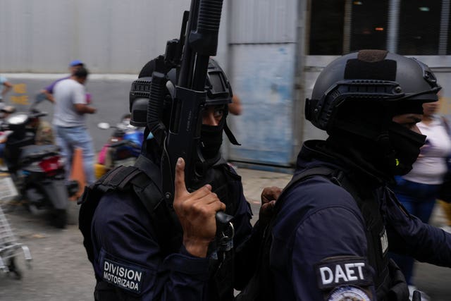 Police leaving the Boleita National Police detention centre where some people arrested during recent opposition protests against the official results of the election are held in Caracas, Venezuela