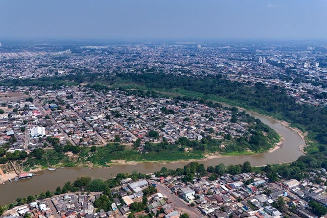 A river winds through an urban area