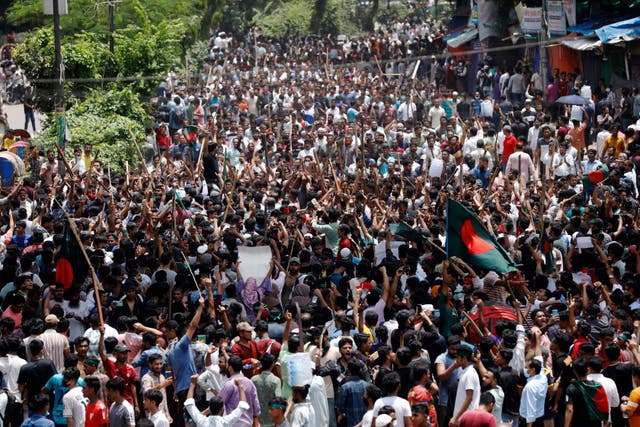 People participate in a rally against Prime Minister Sheikh Hasina 