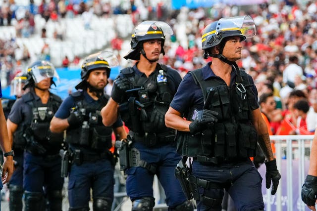 Police are seen near the pitch during a men’s semifinal soccer match between Morocco and Spain at the 2024 Summer Olympics