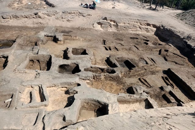 The site where archaeologists discovered 63 mud-brick tombs 