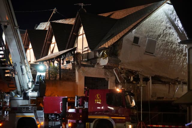 A fire engine at the scene of the hotel collapse