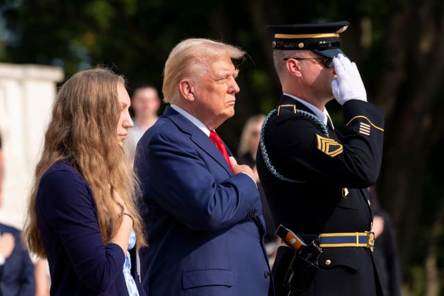 Donald Trump with relatives of servicemen killed in action at the Tomb of the Unknown Solider at Arlington National Cemetery