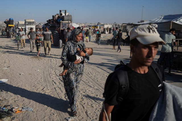 Palestinians flee the Khan Younis area of the Gaza Strip