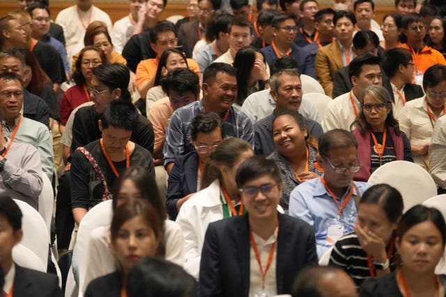 Members of the disbanded Move Forward Party prepare to attend a meeting in Bangkok, 