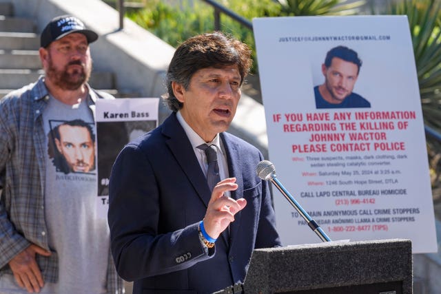 Los Angeles council member Kevin de Leon, surrounded by friends of the late actor Johnny Wactor