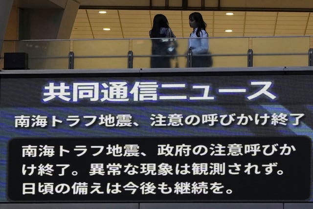 A monitor shows a message that Japan’s government announced the end of its week-long drive for increased caution and preparedness for a possible megaquake 