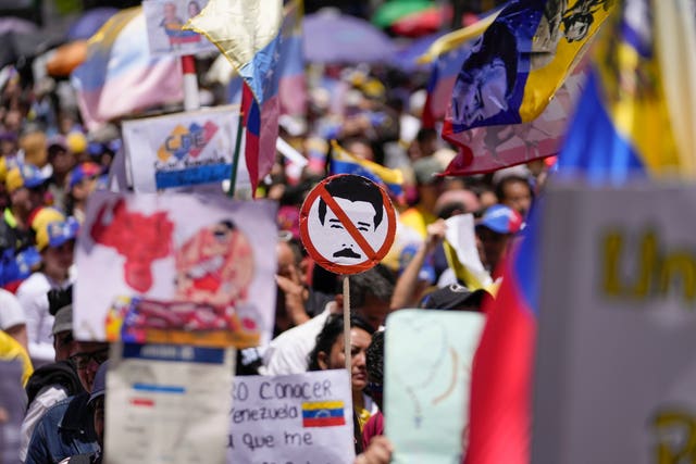 Flags and placards held up at protest