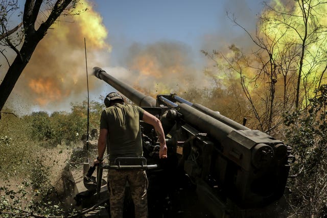 Servicemen of the 24th Mechanised Brigade fire a 'Giatsint-S' 152mm self-propelled howitzer towards Russian positions near Chasiv Yar town, in Donetsk region, Ukraine