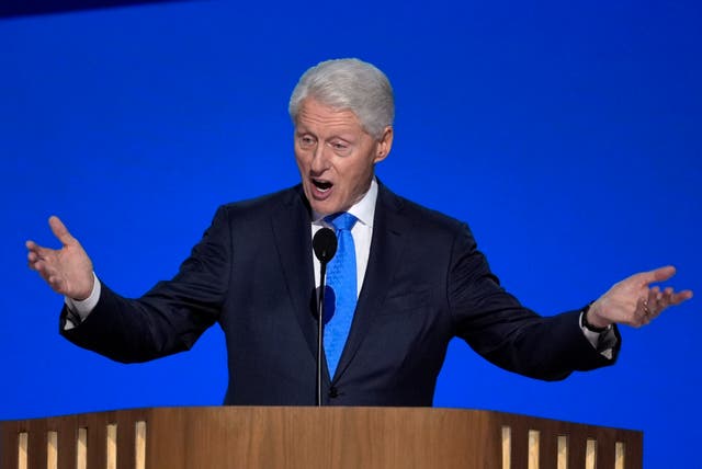 Bill Clinton gestures during his speech