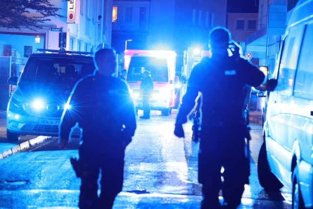 Police and ambulances near the scene where people were killed and injured in an attack at a festival in Solingen, western Germany, the German dpa news agency reported 