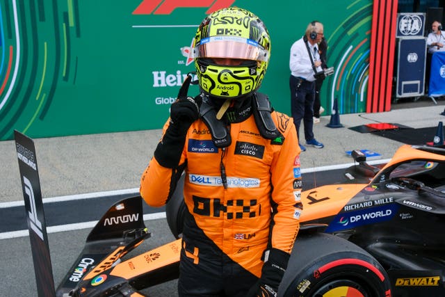 Lando Norris celebrates his pole position