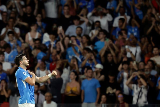 Napoli’s Khvicha Kvaratskhelia celebrates after scoring his team’s second goal in a 3-0 Serie A win over Bologna