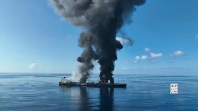 A frame grab from a video released by the Ansar Allah Media Office shows explosions striking the Greek-flagged oil tanker Sounion in the Red Sea  