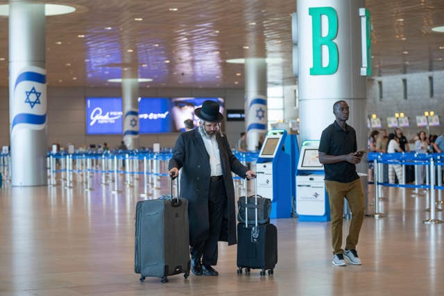 Travelers line up at Ben Gurion International Airport near Tel Aviv,