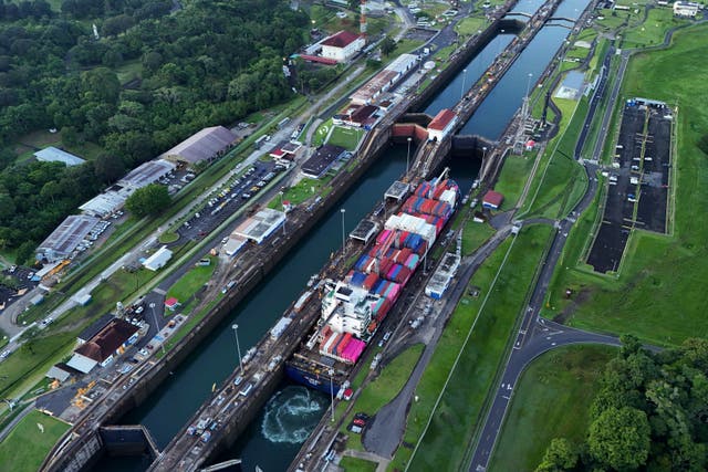 A cargo ship traverses the Agua Clara Locks of the Panama Canal in Colon, Panama 