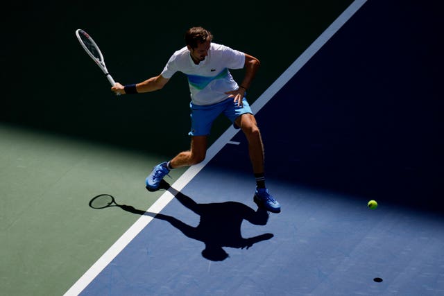 Daniil Medvedev hits a forehand