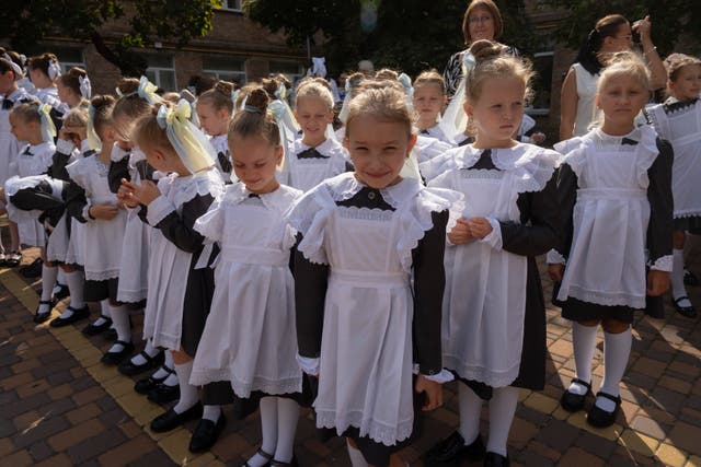 Schoolgirls attend the first day at school in a cadet lyceum in Kyiv, Ukraine