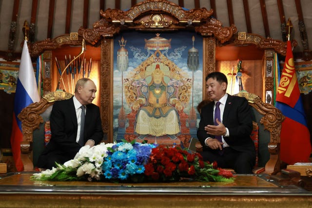 Russian President Vladimir Putin, left, and Mongolian President Ukhnaagiin Khurelsukh attend a meeting at the Saaral Ordon Government Building in Ulaanbaatar, Mongolia