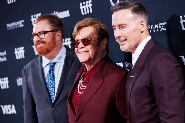 RJ Cutler, left, Sir Elton John and David Furnish 