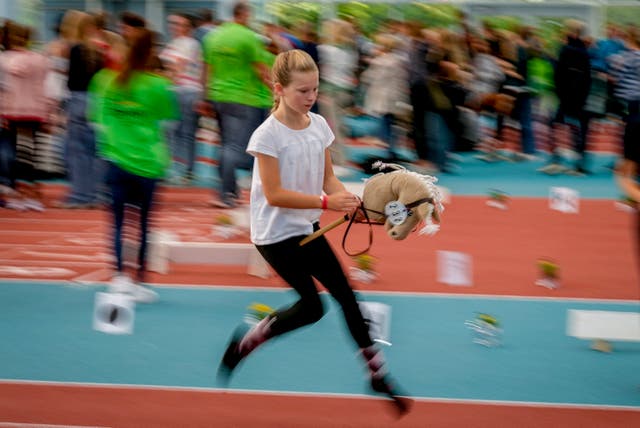 A participant competes in the dressage event at the competition