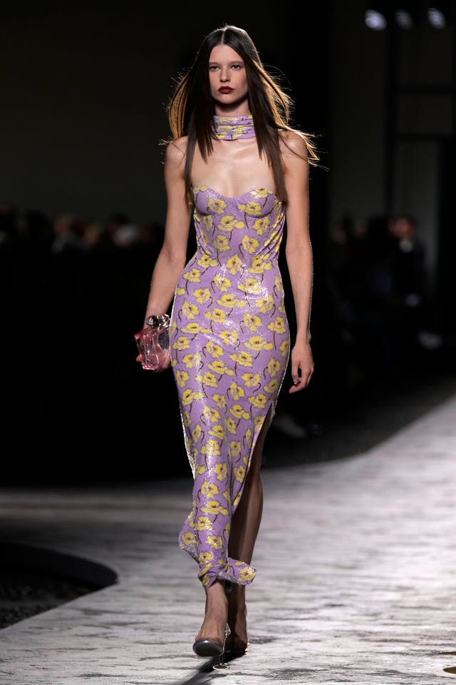 A model wears a creation as part of the Versace Spring Summer 2025 collection