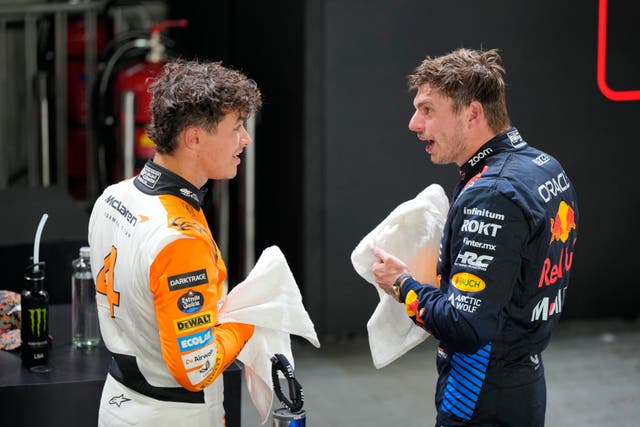 McLaren driver Lando Norris of Britain, left, talks with second placed Red Bull driver Max Verstappen of the Netherlands