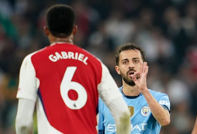 Manchester City’s Bernardo Silva gestures at Arsenal’s Gabriel