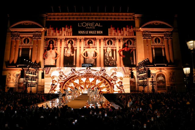 Dancers perform as part of the L'Oreal Spring/Summer 2025 collection event presented Monday, Sept. 23, 2024 in Paris.