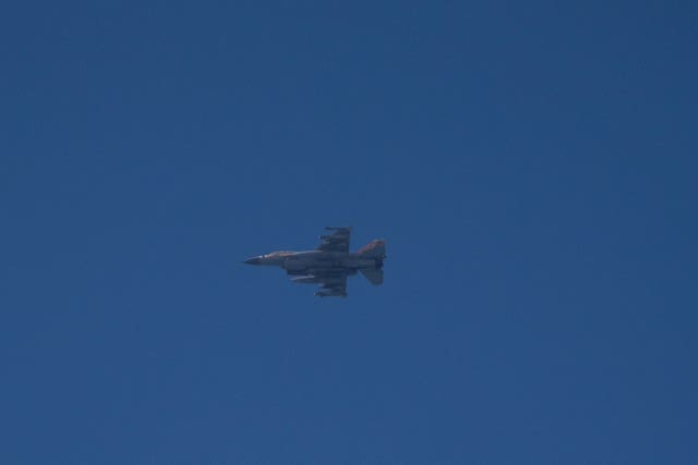 An Israeli fighter jet is seen from Hadera