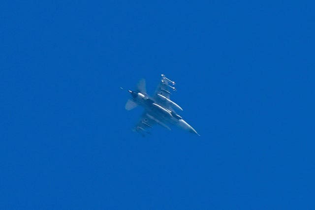 An armed Israeli fighter jet is seen from Haifa, northern Israel