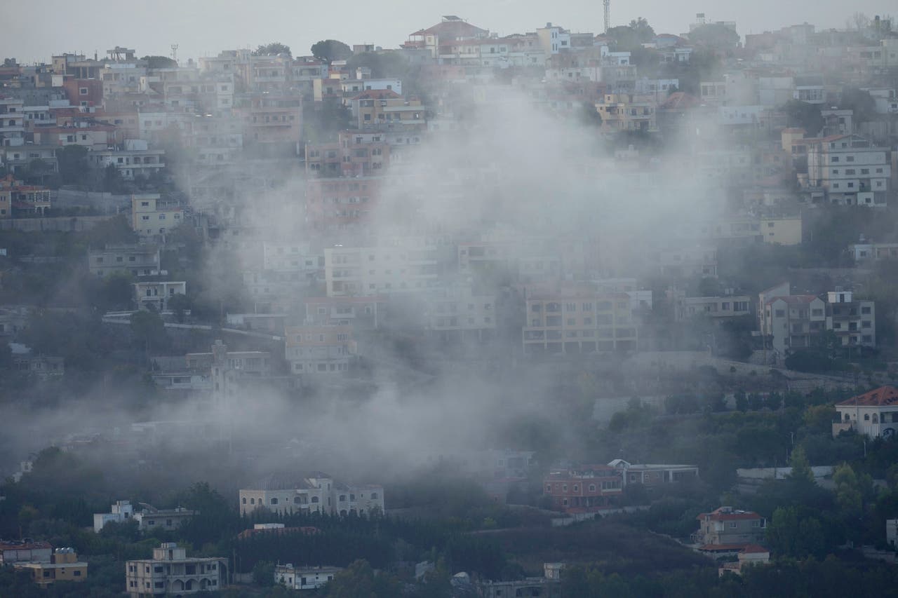 Israel calls for evacuation of places Hezbollah stores arms amid new