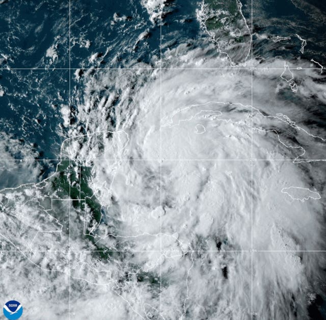 A satellite image shows Tropical Storm Helene off the Gulf Coast of Florida